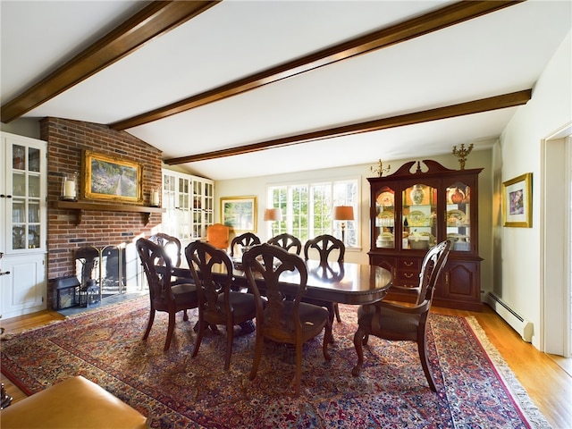 dining room with french doors, light wood-type flooring, lofted ceiling with beams, and baseboard heating