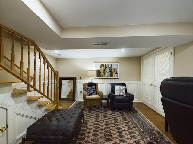 sitting room featuring dark hardwood / wood-style flooring