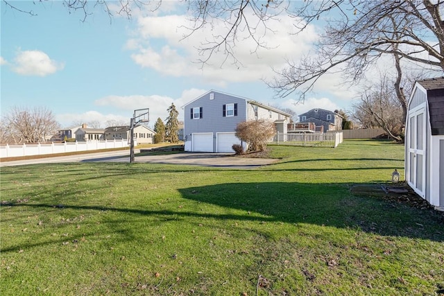 view of yard featuring a garage