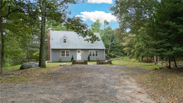 view of new england style home