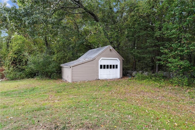 garage with a lawn