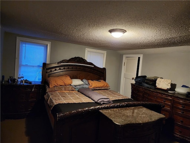 bedroom with a textured ceiling