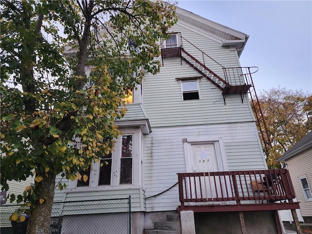 rear view of house with a balcony