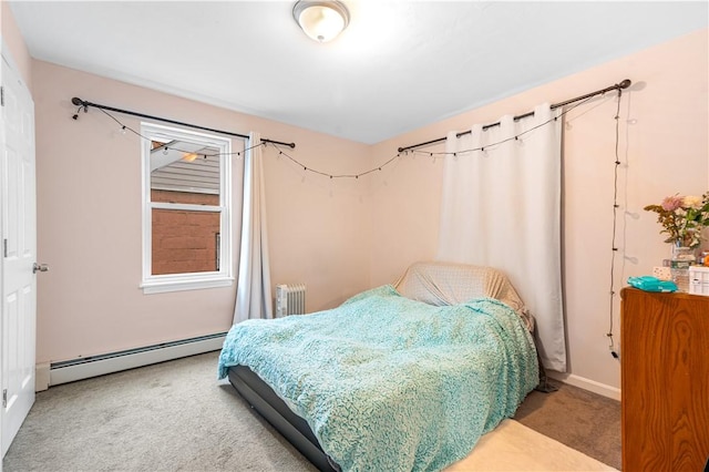 carpeted bedroom featuring baseboard heating and radiator heating unit