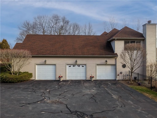 view of property exterior featuring a garage