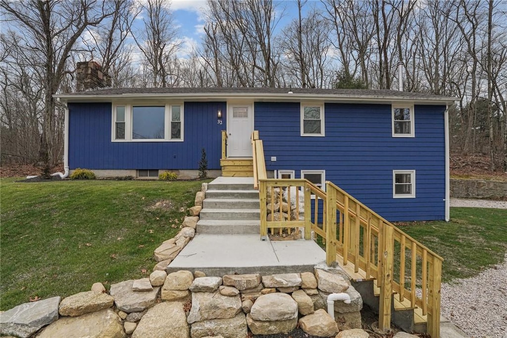 view of front of house with a front yard