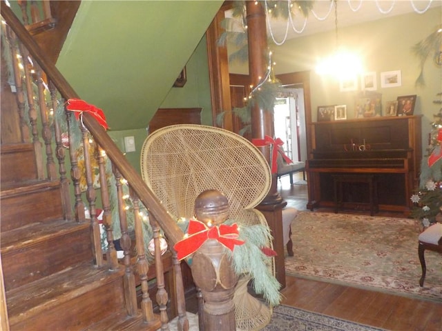 staircase featuring hardwood / wood-style flooring