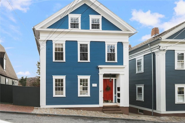 view of greek revival inspired property