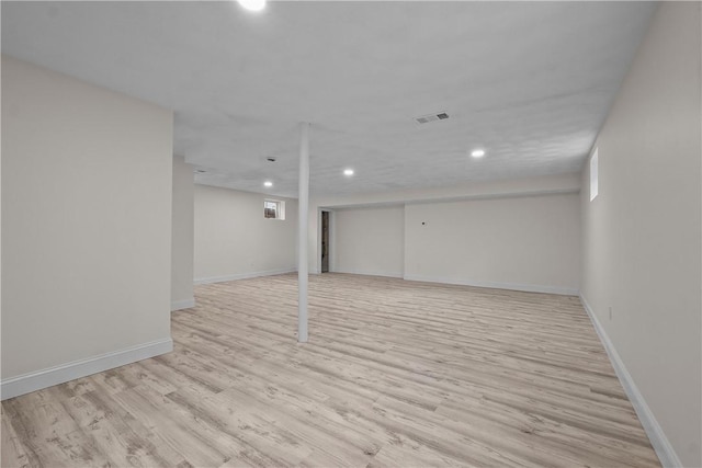 basement with light wood-type flooring