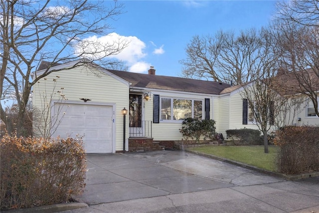 single story home featuring a garage