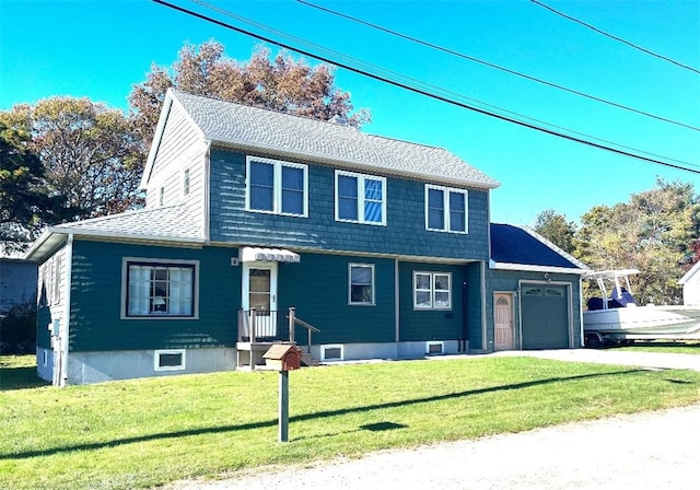 130 Pequot Dr, Charlestown, RI 02813 - view of front of home featuring an attached garage, a front lawn, roof with shingles, and concrete driveway