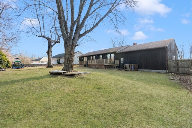 view of yard with a wooden deck