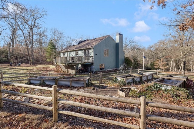 rear view of house with a rural view