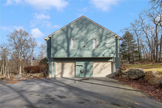 exterior space with a garage