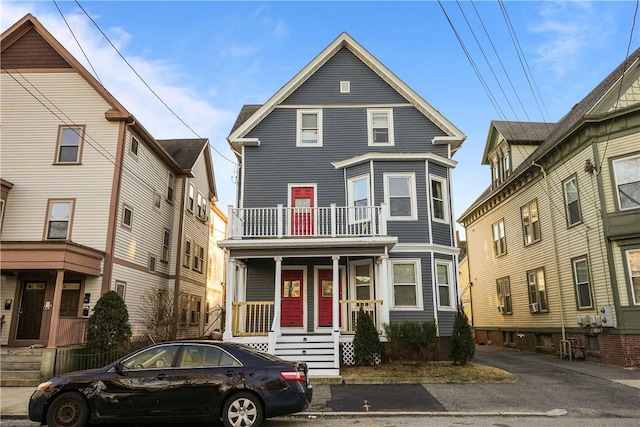 front of property with a balcony