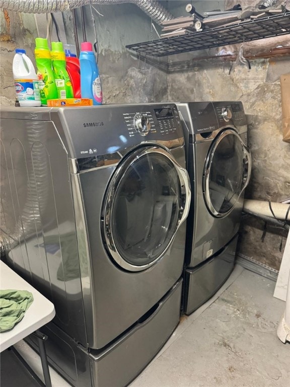 washroom with washer and clothes dryer