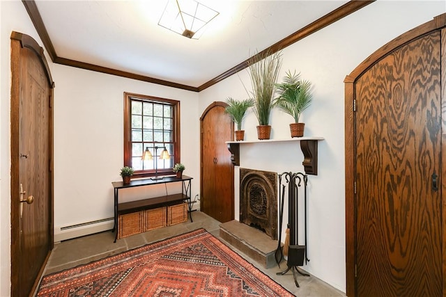 living area with baseboard heating and crown molding