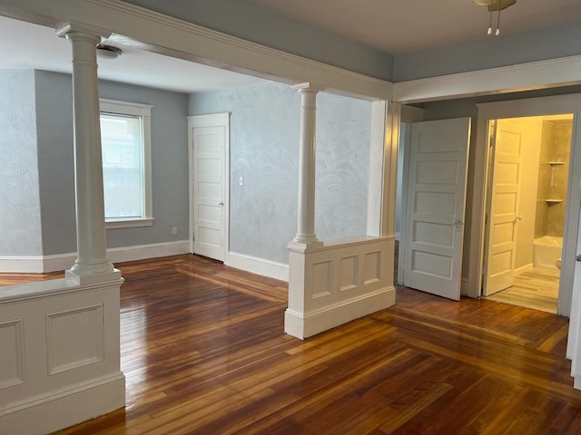 unfurnished room featuring dark hardwood / wood-style flooring