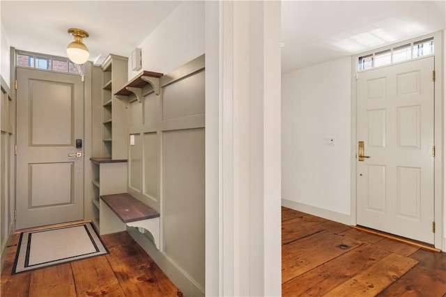 foyer with dark hardwood / wood-style floors