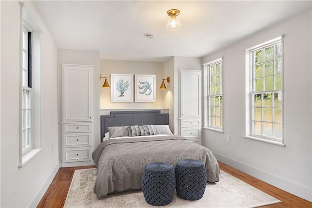 bedroom featuring hardwood / wood-style floors