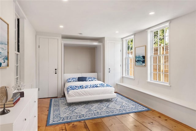 bedroom featuring light hardwood / wood-style floors