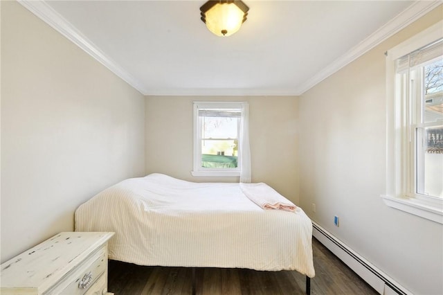 bedroom featuring dark wood-type flooring, baseboard heating, and crown molding