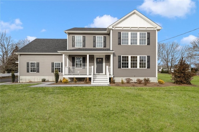 view of front of property featuring covered porch and a front yard