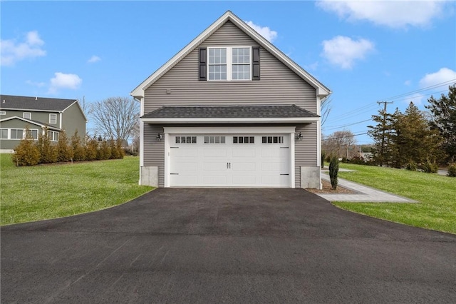 exterior space with a lawn and a garage