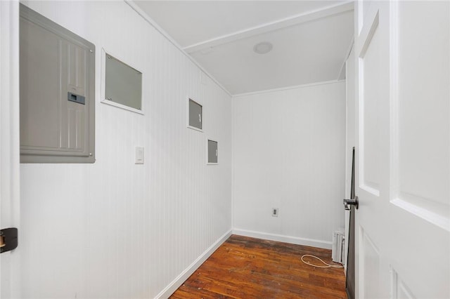 laundry room featuring dark hardwood / wood-style floors and electric panel