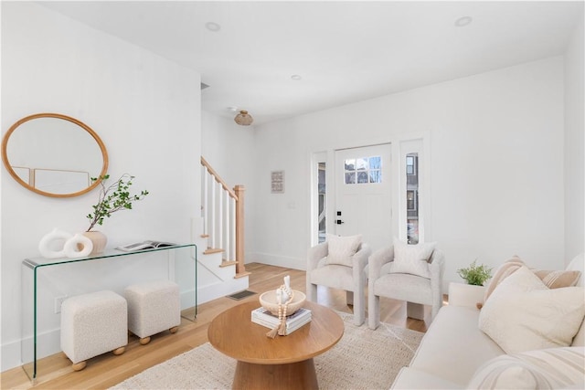 living room with light hardwood / wood-style floors