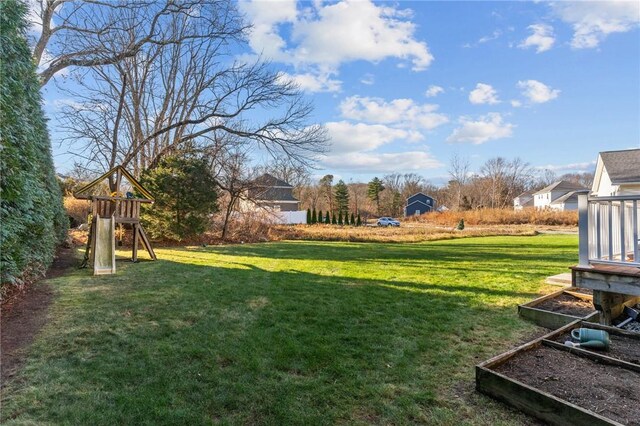 view of yard with a playground