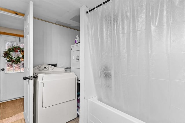 washroom featuring light wood-type flooring and washer / dryer