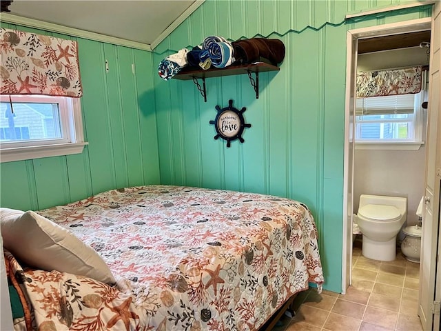 tiled bedroom with crown molding