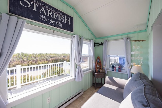 sunroom / solarium with lofted ceiling and baseboard heating