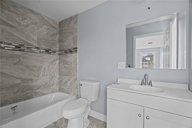 full bathroom featuring vanity, tiled shower / bath combo, and toilet