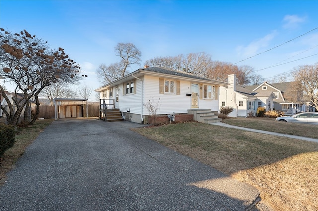 view of front of home with a front yard