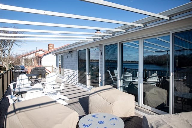 view of patio with outdoor dining space and a grill