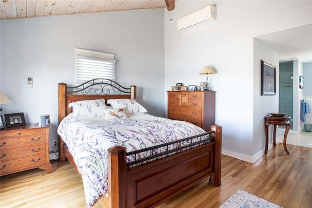 bedroom with lofted ceiling, baseboard heating, a wall mounted air conditioner, and wood ceiling