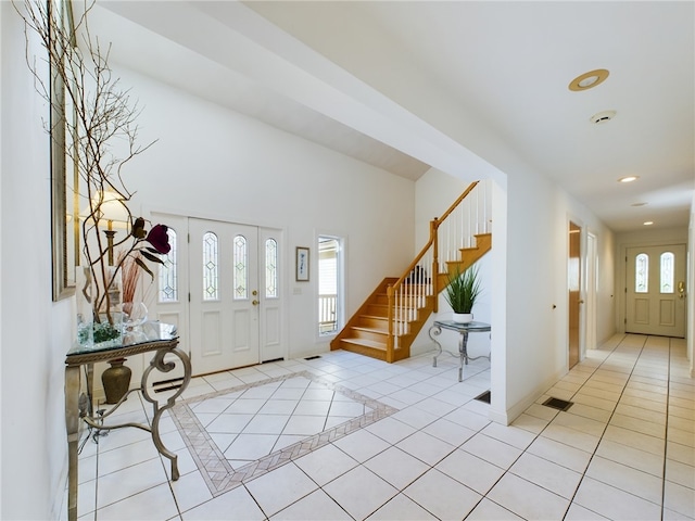 foyer with light tile patterned floors