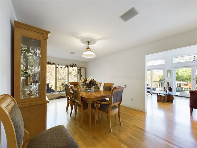 dining area featuring light hardwood / wood-style flooring