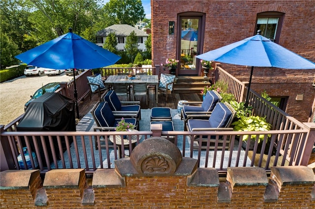 deck with an outdoor hangout area