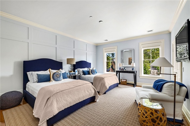 bedroom featuring crown molding