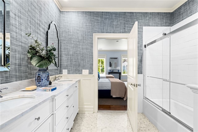 bathroom featuring combined bath / shower with glass door, vanity, tile patterned floors, and ornamental molding