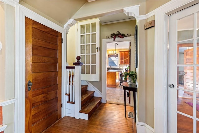 foyer with hardwood / wood-style flooring