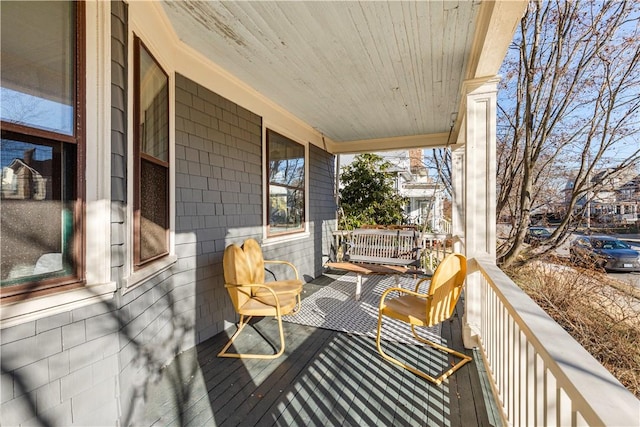 exterior space featuring covered porch