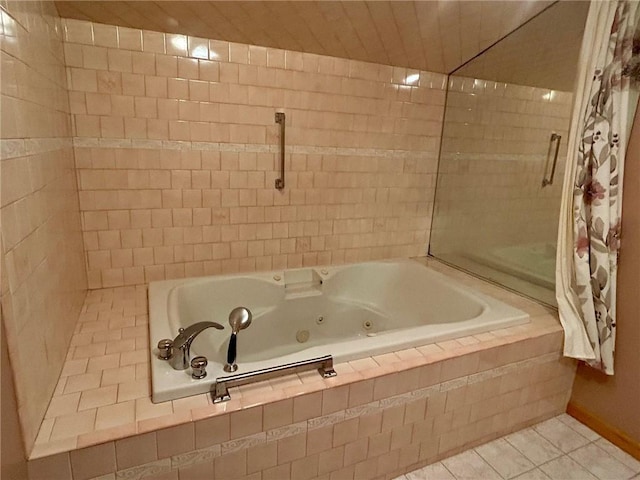 bathroom with tile patterned floors and independent shower and bath