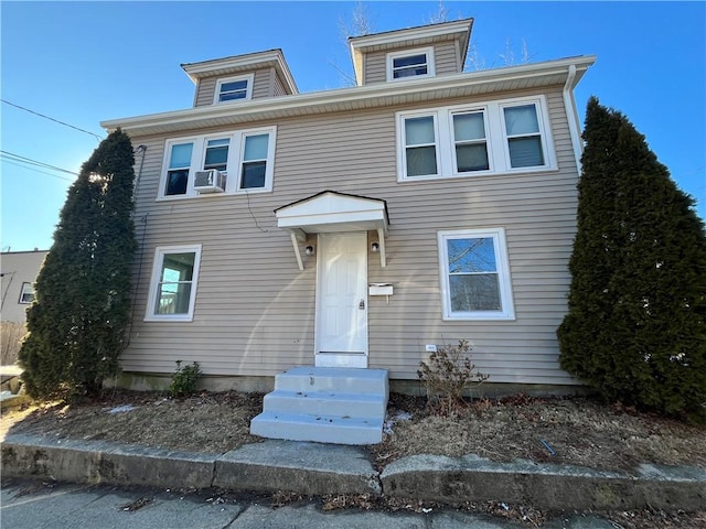 view of front of property with cooling unit