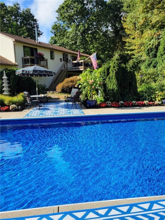 view of pool featuring a patio area