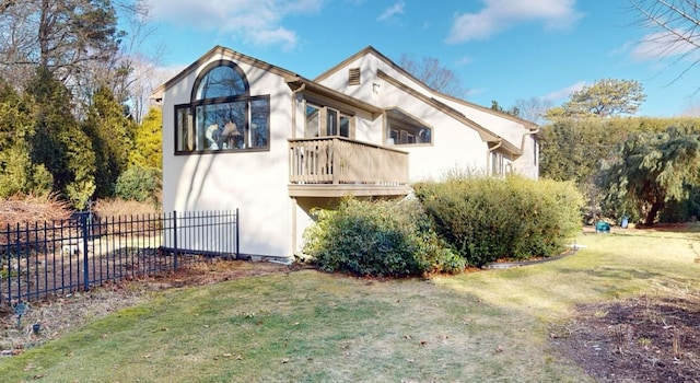 view of property exterior featuring a yard