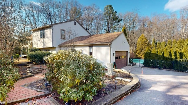 exterior space featuring a garage